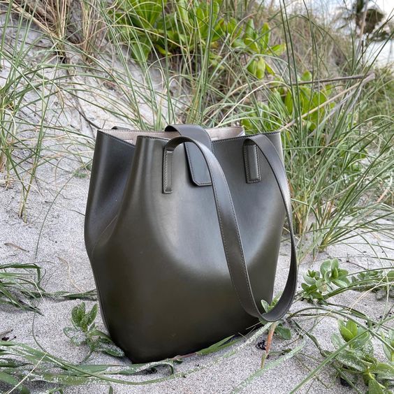 Green Luxury Tote Bag Supports the Environment Minimalist Style Olive Green Leather Tote Bag on the Beach