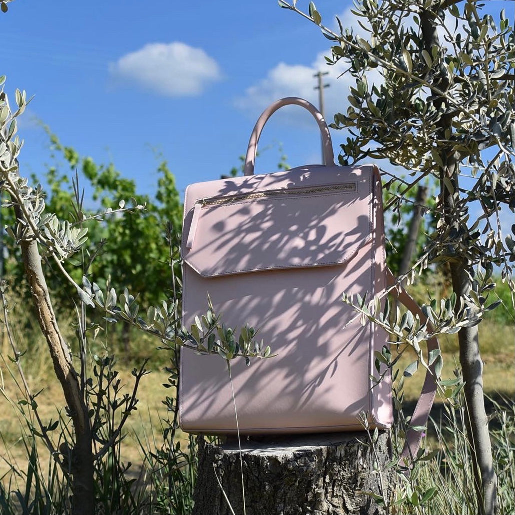 Lo Zaino Pink Backpack, minimalist style handbag made with smooth matte leather, by Chandra Keyser